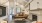 a spacious room with a fireplace