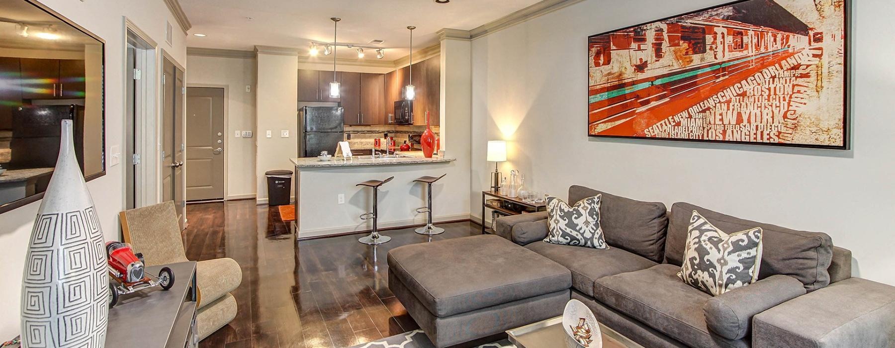 a living room with a couch and a table