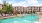 a pool in front of a building