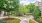 a courtyard with trees and buildings