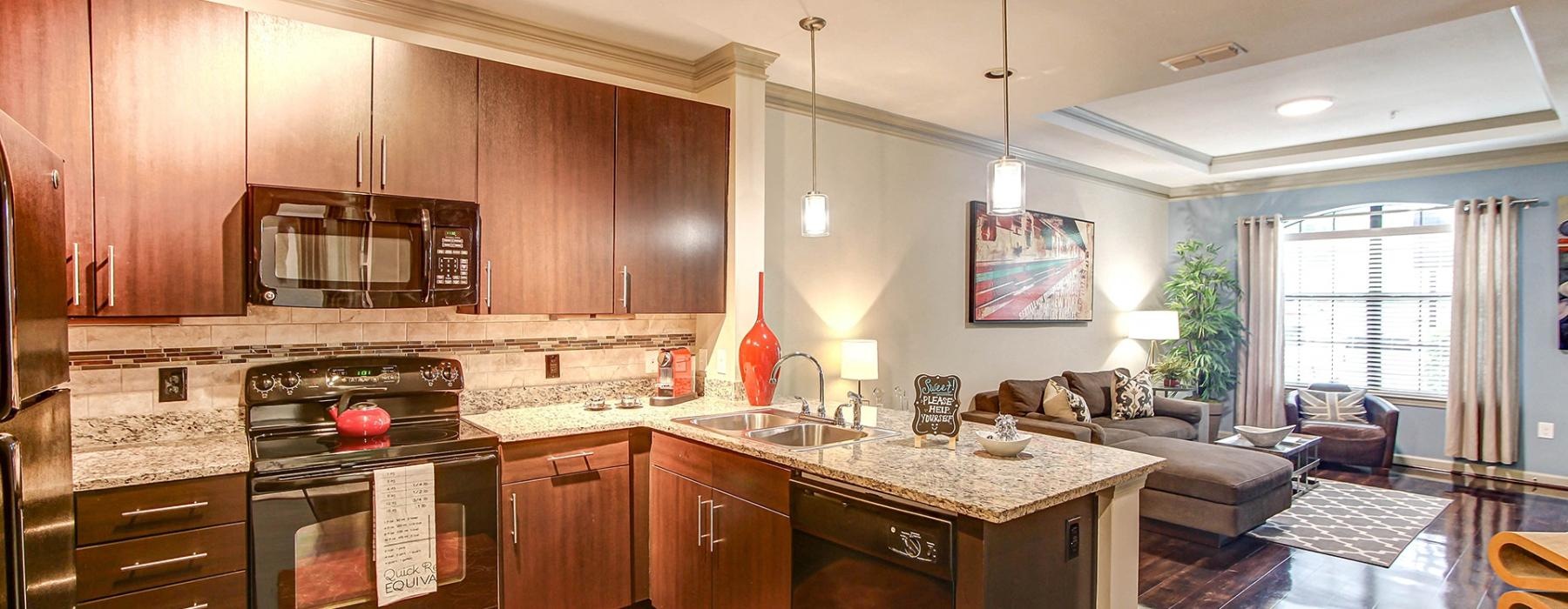 a kitchen with wooden cabinets
