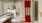 a bathroom with a red curtain