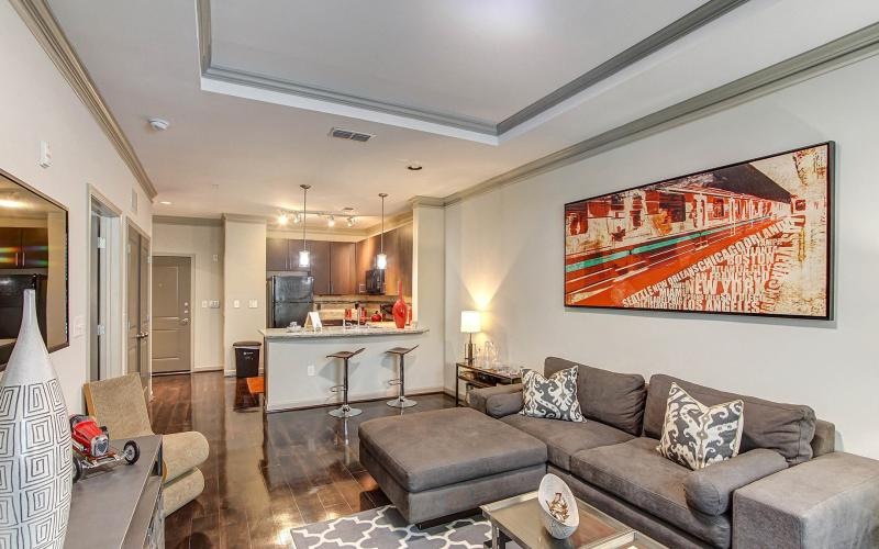 a living room with a couch and a table